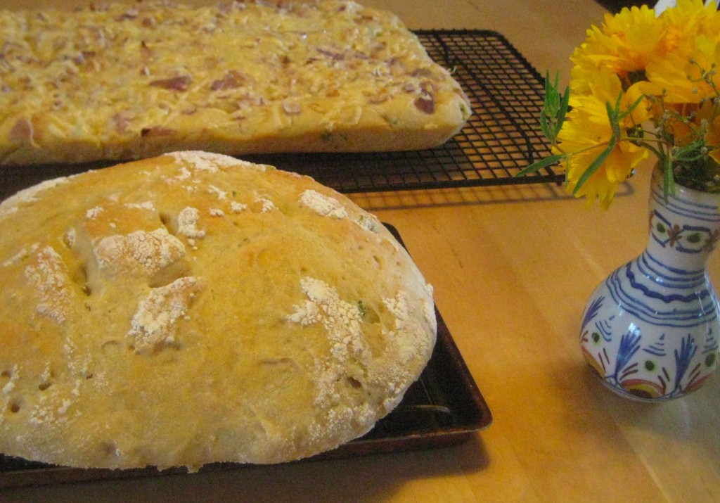 Ready to eat: sourdough focaccia flatbread and jalapeno-studded oval loaf. (photo by Lucy Martin)
