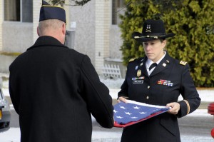 American Legion Post 326 First Vice Commander Bob Marvin and Post Adjutant CPT Jordanna Malach fold the flag.