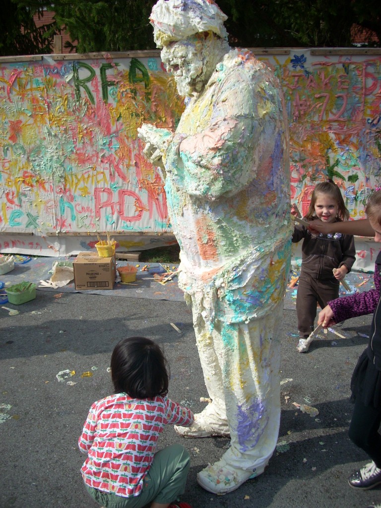 ... and how colorful he is after being 'painted' by so many kids.  I would not want to drive home in that outfit!