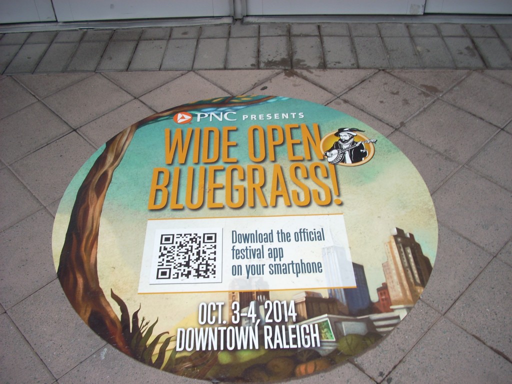 The city of Raleigh has made a huge effort to make bluegrass visitors feel welcome in "The City of Oaks".  These decals are strategically placed on the sidewalks in the downtown area, and there's bluegrass music playing from public speakers in  City Center.