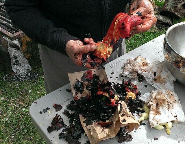 It gets pretty messy skinning charred peppers. Photo: Mary McCallion