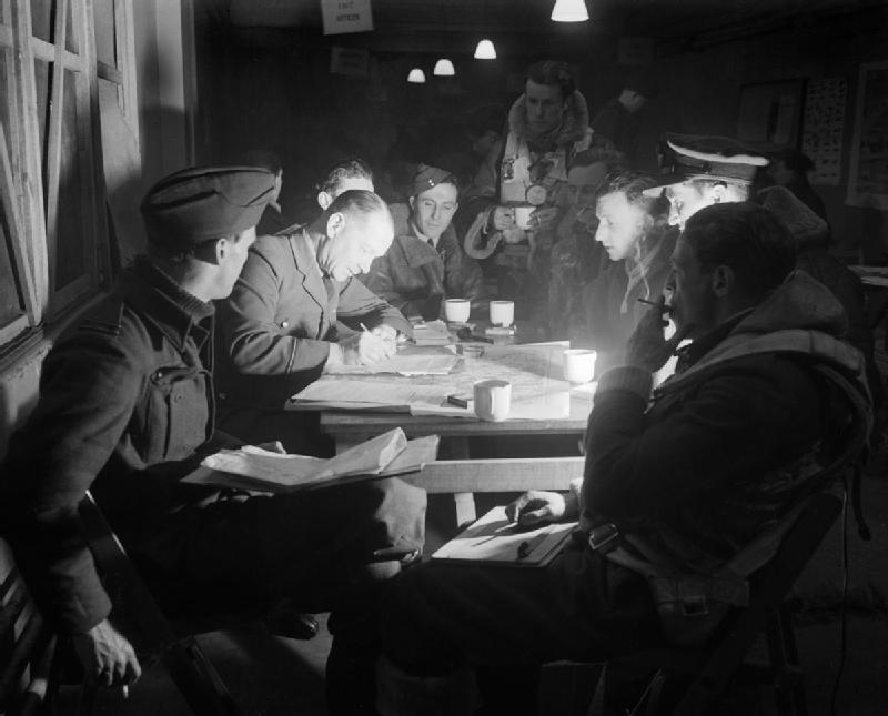 Post-mission debriefing. Photo: A. Goodchild, UK Royal Air Force photographer