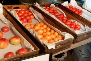 Ripening tomatoes on a tray out of direct sunlight is a better method. Better still would be to wrap them in newsprint. Photo: Dwight Sipler, Creative Commons, some rights reserved