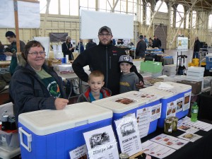 Griffith Farm from Golden Lake, Ontario raises natural beef and pork and sells it at the Winter Market in Ottawa.  Left to right; Margaret Ann Griffith, Isaac Gallant, Ayden Gallant, and Robert Griffith. Photo: James Morgan