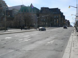 Canada's 2016 budget includes a big boost on road and highway spending.  Wellington Street in Ottawa, looking towards the Langevin Block, home of the Prime Minister's Office, needs some repairs.