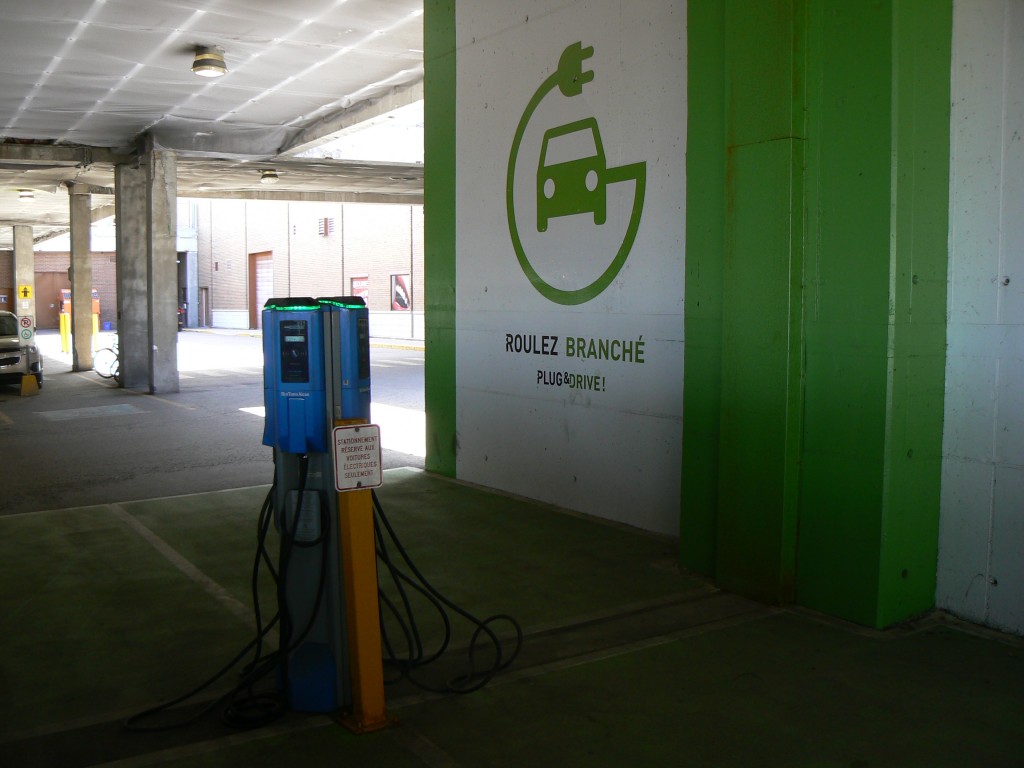 The Plug and Drive electric vehicle charging station in the parking garage at Les Galeries de Hull mall in Gatineau, Quebec.  The station allows four cars to charge at the same time.  Photo by James Morgan