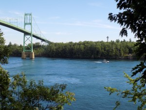 The Canadian Span of the Thousand Islands Bridge and Georgina Island.  The 1000 Islands Tower on Hill Island is in the distance.  Photo by James Morgan.