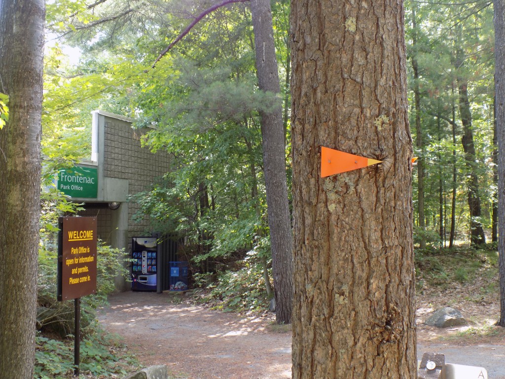 In addition to the many park trails, the 240 mile/387 kilometer Rideau Trail goes through Frontenac Provincial Park on its route from Kingston to Ottawa.  The orange triangle marker shows the way past the park office and visitor center.  Photo by James Morgan