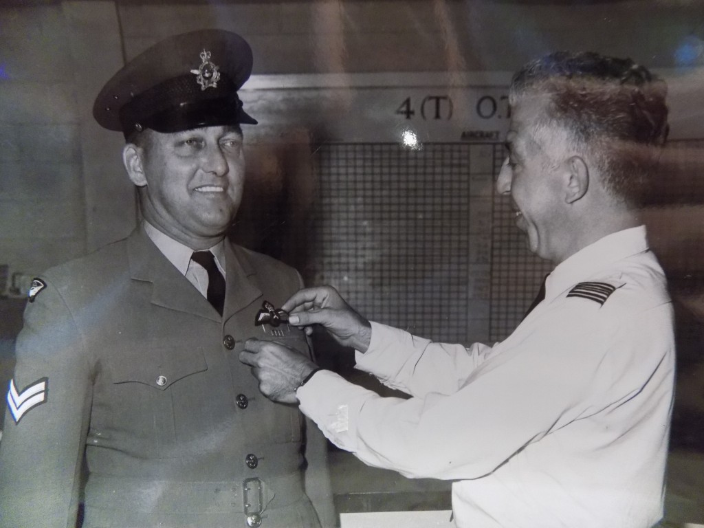 My grandfather (left)receiving his Flight Engineer's wings in approximately 1967.