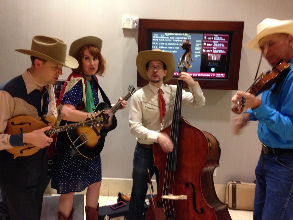 There is music everywhere.  Escalators, elevators, lobbies, street corners, every corner of the hotel.... everywhere.  This is The Farmer and Adelle .  The Farmer is wearing a hat that belonged to Bill Monroe!