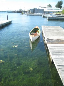 Cool, clear water. Gorgeous wooden boat. Can't you hear it calling?