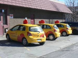 Poultry Patrol: St. Hubert delivery cars at the ready outside the restaurant in Hull.  Photo by James Morgan