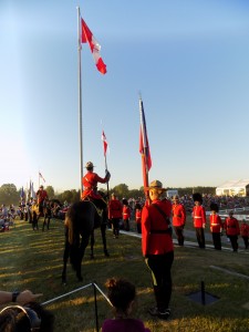 The Sunset Ceremony ended with singing O Canada and an honor guard lowering the flag.  Photo by James Morgan