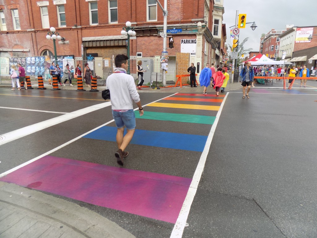 Diversity Crossing: Bank and Somerset Streets is the centre of Ottawa's LGBTQ Village.  The crosswalks are even rainbow flag-themed.  Photo by James Morgan