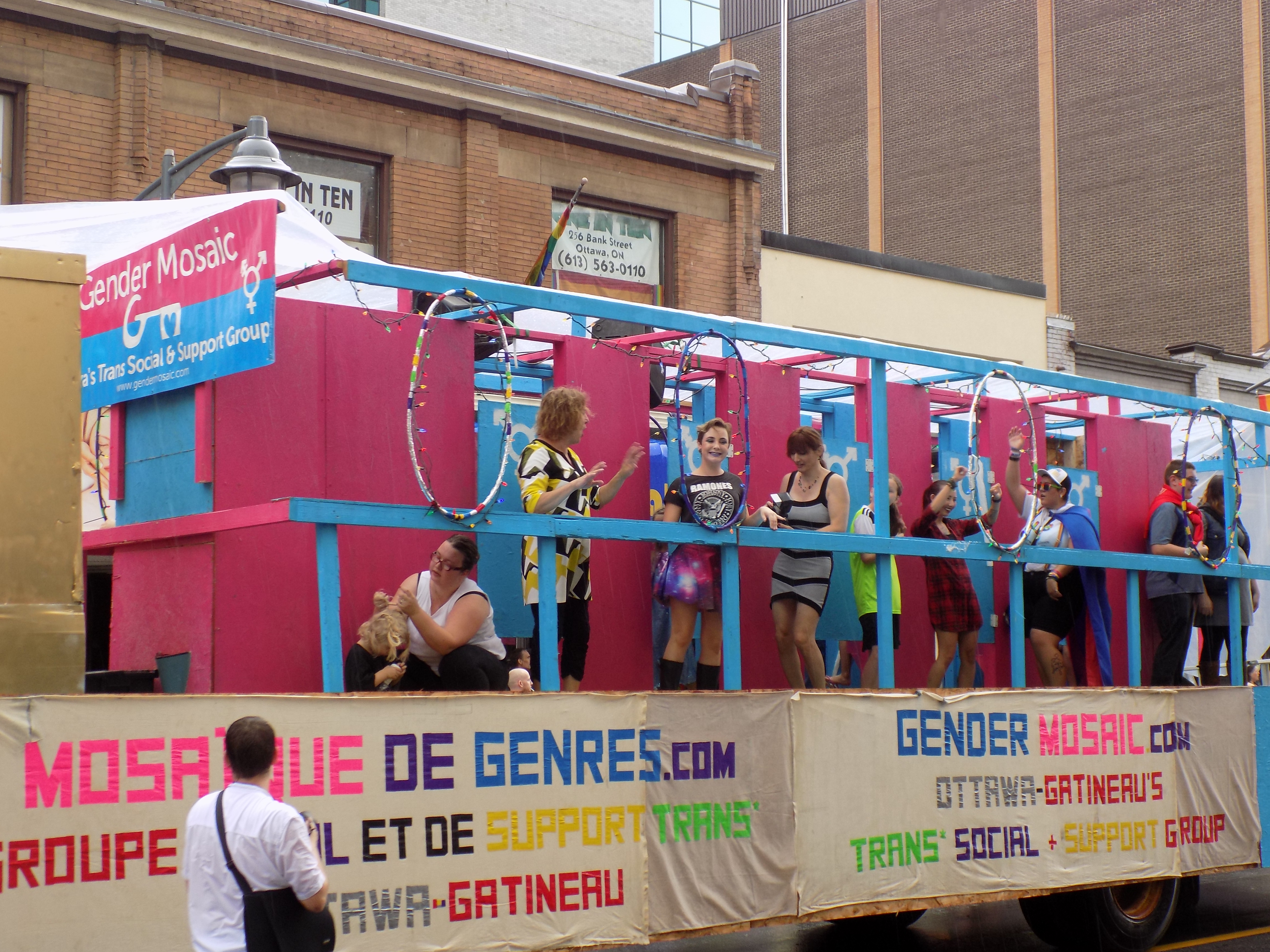 Making the case for transgender-inclusive restrooms. One of the floats in the Ottawa Pride Parade.  Photo by James Morgan