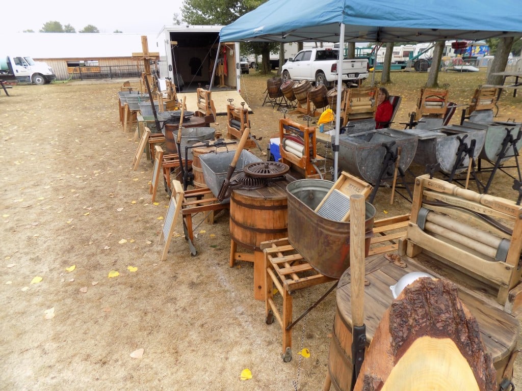 Antique tractor and machinery displays are a big part of many rural fairs, but farm laundry always had to get done somehow too.  These antique washing machines are owned by local collector Sheridan Coates.  He laughed when I suggested he open a laundromat.  Photo by James Morgan