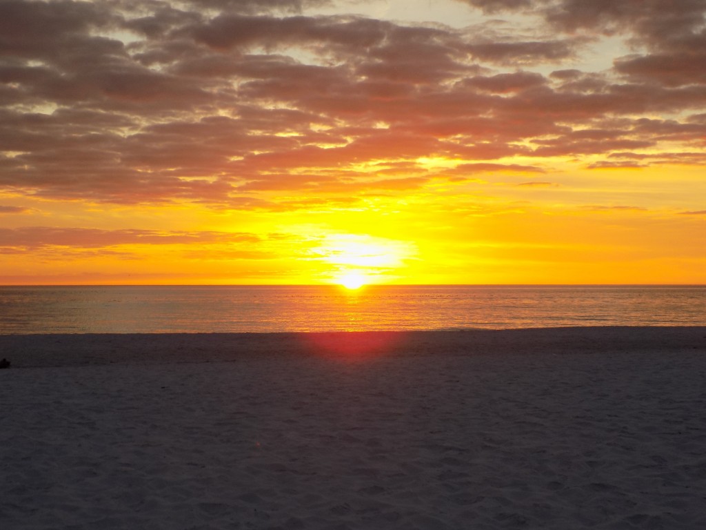 Sunsets like this one of Siesta Key, Florida cannot be enjoyed comfortably in Canada or the North Country in January.  Photo: James Morgan