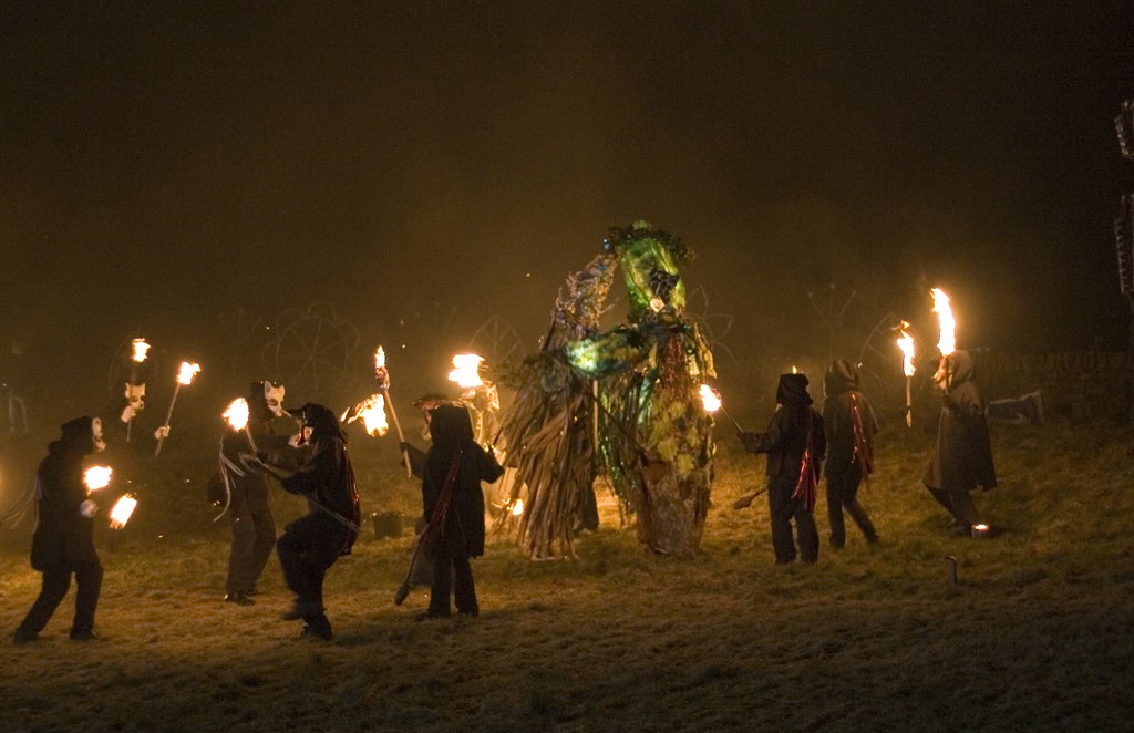 Fire-bearers circle figures of The Green Man fighting Jack Frost. Imbolc celebration in Marsden, West Yorkshire. Photo: Steven Earnshaw, Creative Commons, some rights reserved