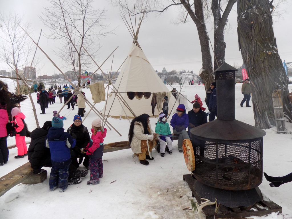 An indigenous village shows Winterlude visitors how Canada's original inhabitants traditionally spend winter.  Photo: James Morgan