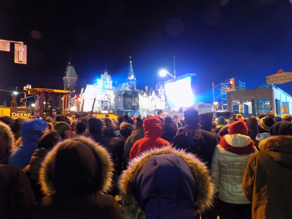 The crowd was so big on Saturday night that thousands of people who could not get close to the canal watched the races on a video screen in Confederation Square.  Photo: James Morgan