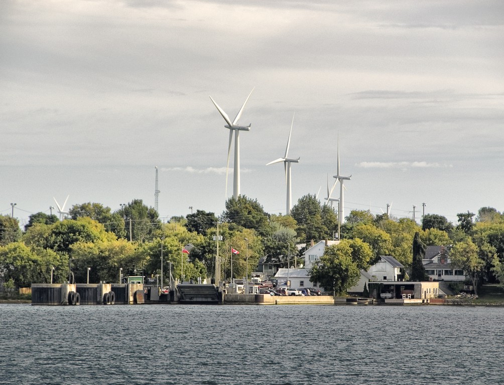 This wind farm on Canada's Wolfe Island can be seen from the Cape Vincert shore. Photo: Liz. Creative Commons, some rights reserved