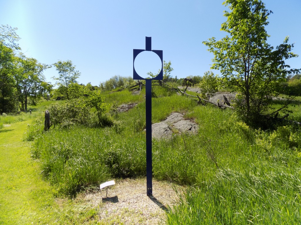 "Modern Totem" by Stefan Duerst stands before a reminder of the Canadian Shield.  Photo: James Morgan