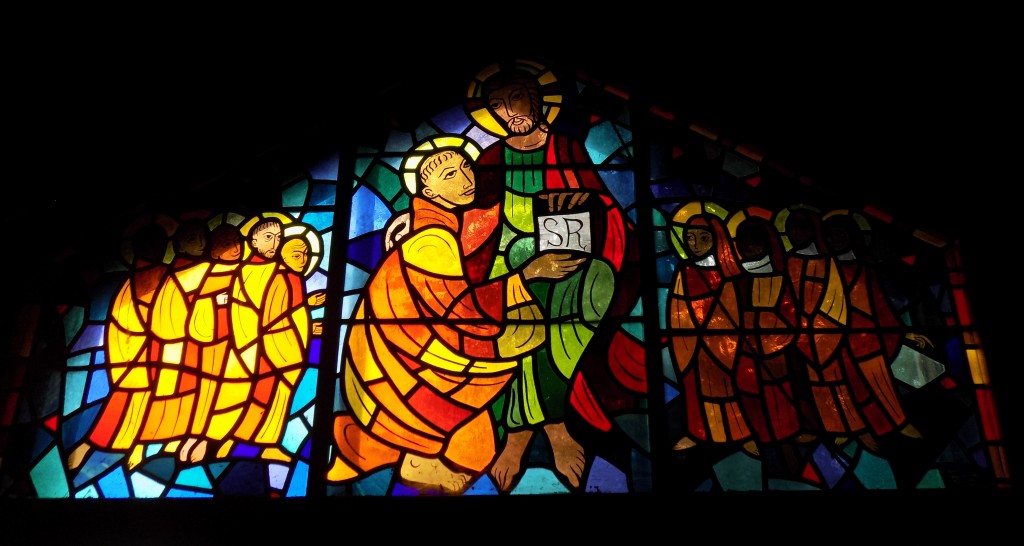 Stained-glass window above the entrance to the Le Tour St. Benoit chapel.  Photo: James Morgan