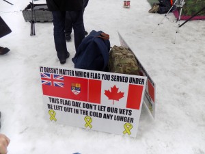 February 15th was the 53rd anniversary of Canada's red maple leaf flag.  This sign at the veteran's protest showed the pre-1965 Red Ensign that many Canadian veterans served under.  Photo: James Morgan.