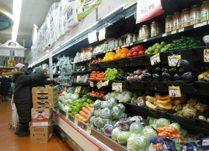 Produce section in East Harlem grocery store. Image by Jim.henderson, Cretive Commons