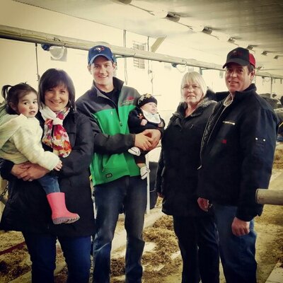 Andrew Campbell, centre, Tweeted this photo of his family from the @FreshAirFarmer account on April 23, 2014. 