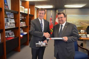 Toronto Mayor John Tory welcomes Montreal Mayor Denis Coderre to Toronto City Hall. "We chatted about strengthening our ties + hockey (of course)." Image: Facebook 
